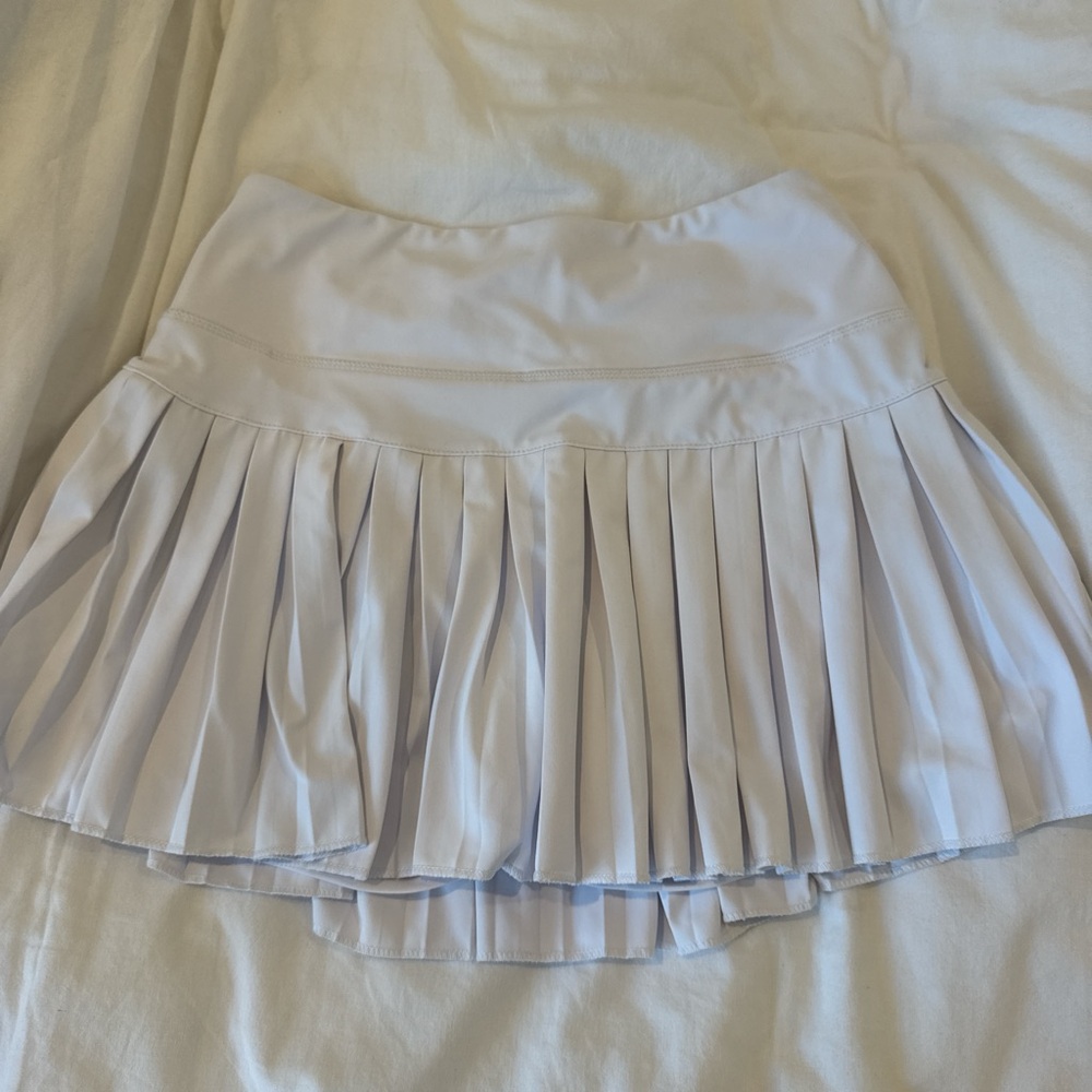 White Pleated Skirt. gold hinge